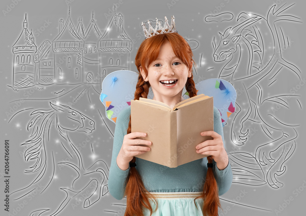 Naklejka premium Cute redhead fairy reading book on grey background