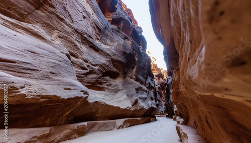 Narrow Canyon with Towering Rock Walls.