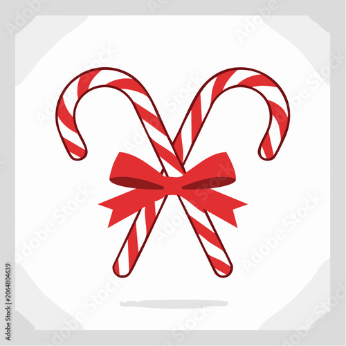 Two Candy Canes Tied with a Red Bow