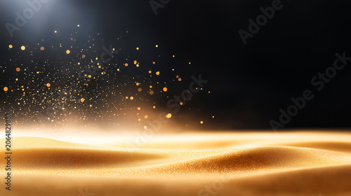 Golden glitter particles explosions and shiny bokeh dust floating over soft velvet sand textures against dark abstract studio background