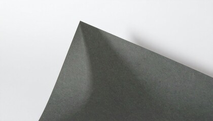 Minimalist Dark Paper Corner Against White Background