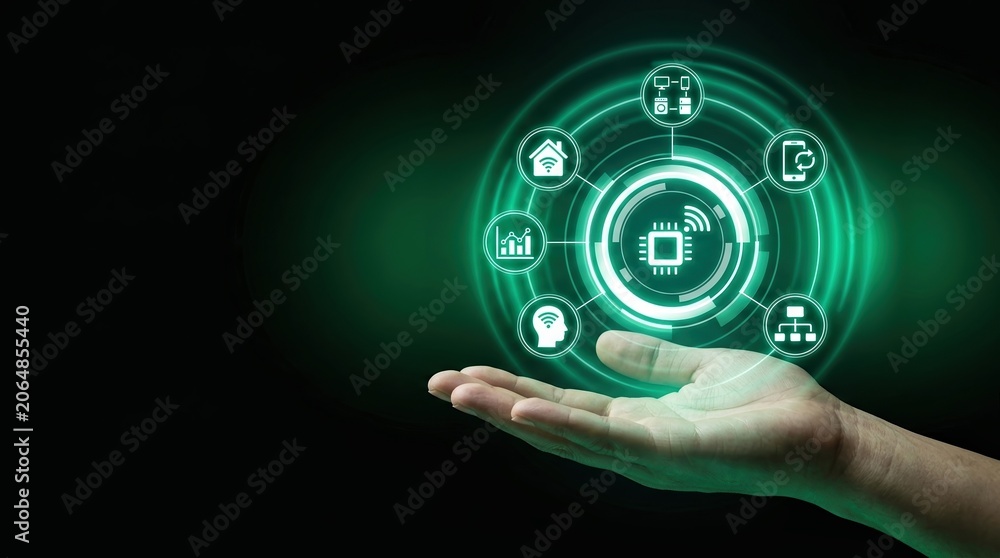 Fototapeta premium IoT, Artificial Intelligence, Smart Home, Digital Transformation, Technology, Innovation, Data Analytics showing a hand holding glowing green holographic icons for future automation.