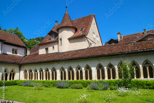 Tableau sur toile Romanesque collegiate church and its cloister with garden in Saint-Ursanne villa