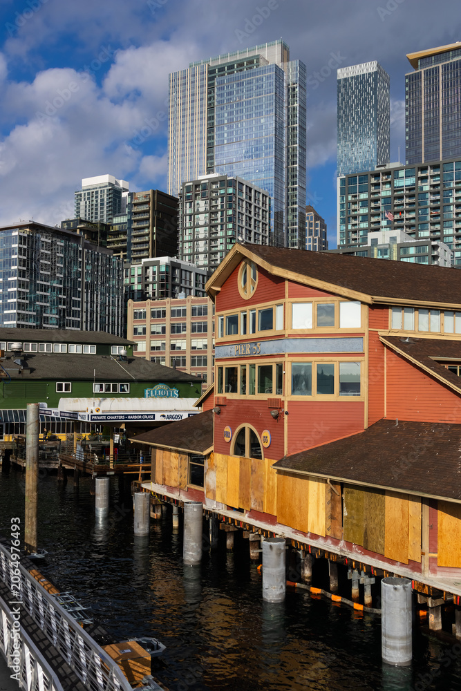 Fototapeta premium Seattle waterfront showing Pier 55 and city Argosy private cruise docks