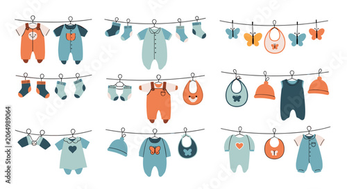 Adorable set of baby clothes, bibs, hats, and socks hanging on a clothesline against a clean white background for nursery decor.