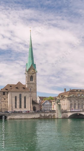 Zurich Switzerland time lapse city skyline at Limmat River with Fraumunster Church (Vertical)