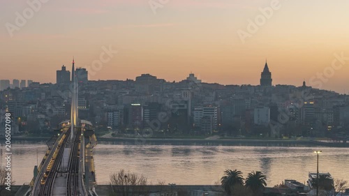 Istanbul Turkiye (Turkey) time lapse sunrise city skyline at Galata Tower Golden Horn and Halic bridge