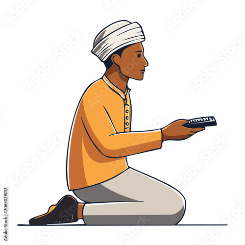 Man in traditional attire kneeling and holding smartphone
