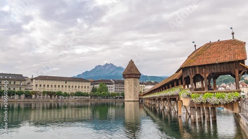 Lucerne (Luzern) Switzerland time lapse city skyline at Chapel Bridge with Pilatus mountain