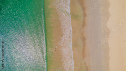 Foto Aerial view of waves rolling onto a beach at Cape Northumberland, South Australi