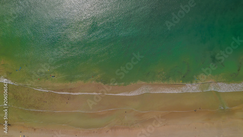 Foto Aerial view of waves rolling onto a beach at Cape Northumberland, South Australi