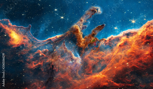 Star forming region somewhere in deep space near pillars of creation in bright color. Science fiction. Elements of the illustration were furnished by NASA
