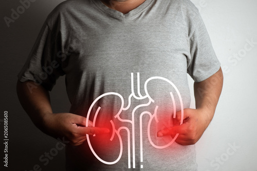 Foto Close up of man suffering from flank pain or kidney disease with glowing human kidneys anatomy graphic on his back body
