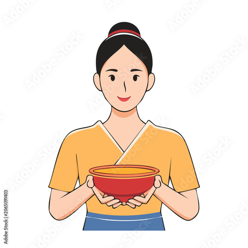 Woman in traditional clothing holding a red bowl