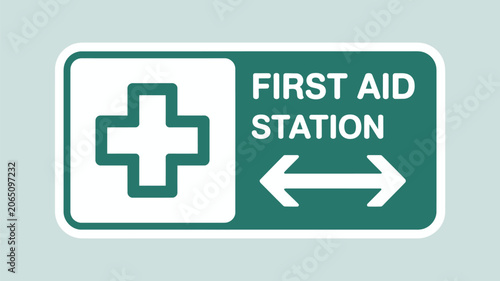 First aid station sign provides clear directional guidance for emergency medical assistance in public buildings.