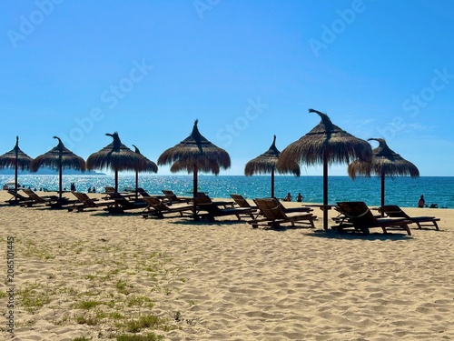 beach with umbrellas