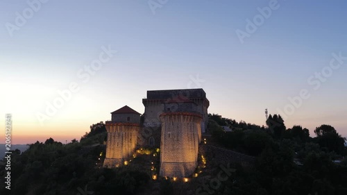 Aerial view of the walls of Ourem Castle in Portugal with historic European scenery.
4K high quality medieval architecture footage.