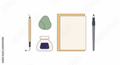 Calligraphy writing tools with inkwell and paper on white background