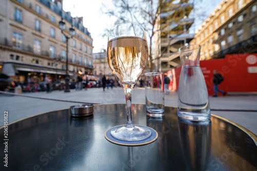 View of a beautiful glass of rosé wine at a restaurant in Paris France