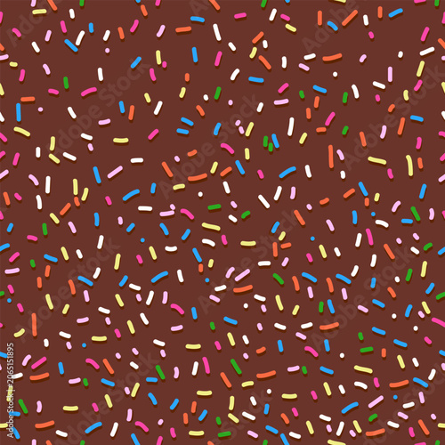 Bild auf Leinwand Chocolate cake cream frosting background with colorful sprinkles