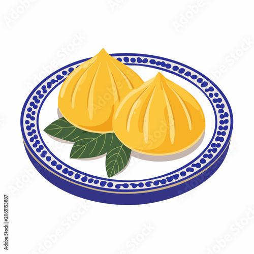 Two Yellow Dumplings on a Blue and White Plate with Green Leaves
