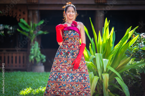 Modern Fashion Protrait Beautiful Asian Woman in Traditional Embroidery Patterns of Ethnic Minorities.