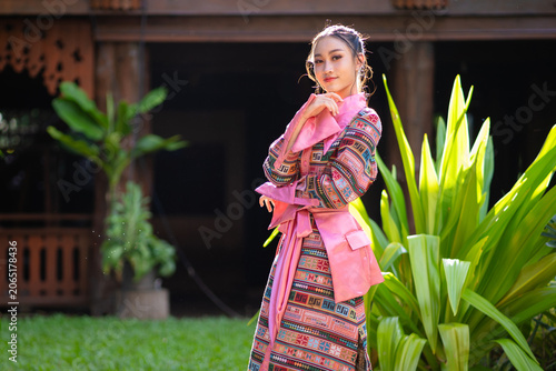 Modern Fashion Protrait Beautiful Asian Woman in Traditional Embroidery Patterns of Ethnic Minorities.
