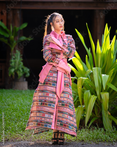 Modern Fashion Protrait Beautiful Asian Woman in Traditional Embroidery Patterns of Ethnic Minorities.