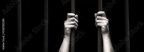 Fotografia Sad young girl in prison