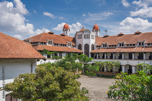 Urban landscape view of historic colonial building Lawang Sewu from courtyard, Semarang, Central Java, Indonesia