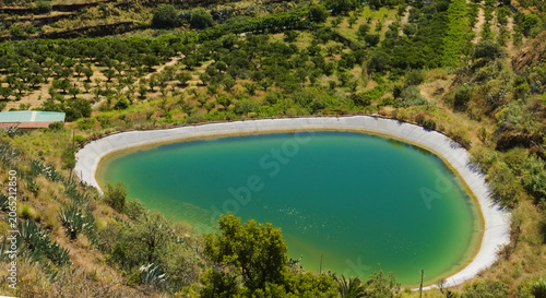 Views along the scenic hiking trail ascending from San Pedro,descending from the high threshing ground Era de Berbique toward the coastal village of Puerto de las Nieves in northwest Gran Canaria, Can