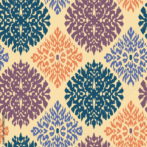 Geometric Seamless Pattern with Diamond and Floral Motifs in Bright Colors