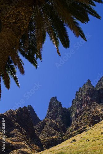 Views along the scenic hiking trail ascending from San Pedro,descending from the high threshing ground Era de Berbique toward the coastal village of Puerto de las Nieves in northwest Gran Canaria, Can