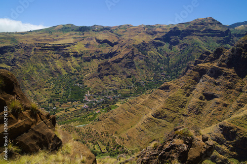 Views along the scenic hiking trail ascending from San Pedro,descending from the high threshing ground Era de Berbique toward the coastal village of Puerto de las Nieves in northwest Gran Canaria, Can