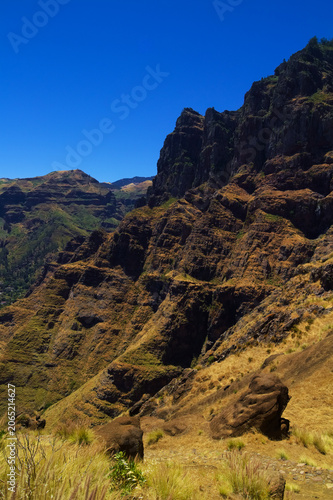 Views along the scenic hiking trail ascending from San Pedro,descending from the high threshing ground Era de Berbique toward the coastal village of Puerto de las Nieves in northwest Gran Canaria, Can