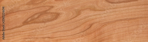 Solid wood tabletop background. Cherry wood plank texture. Cherry wood solid wood long tabletop. wooden texture background	