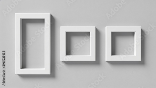  features a minimalist style with three white picture frames arranged horizontally against a light gray background.