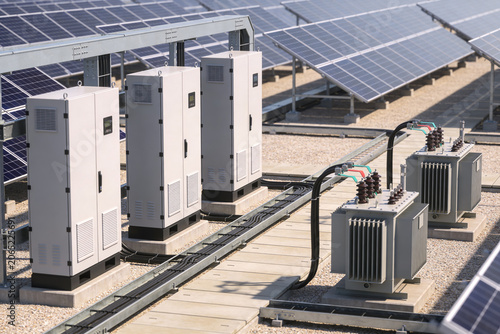 Solar power station equipment with inverters and transformers on a rooftop