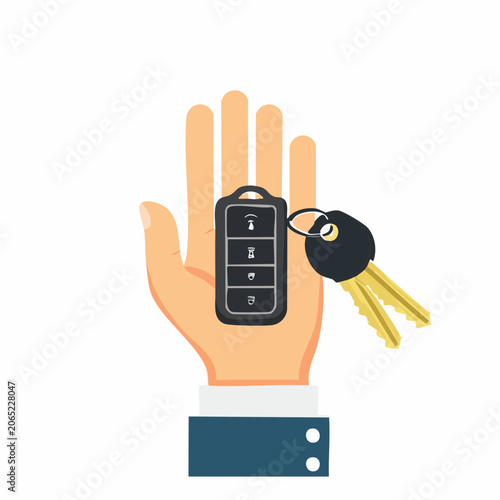 Hand Holding Car Keys and Remote Fob