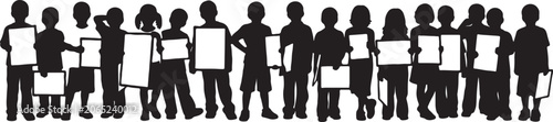 Fotografia Group of children standing in line holding up blank signboards with children sil
