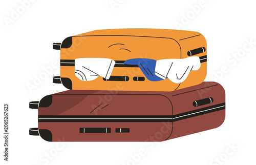 Stacked trolley suitcases lying. Travel bags, luggage overpacked with clothes...