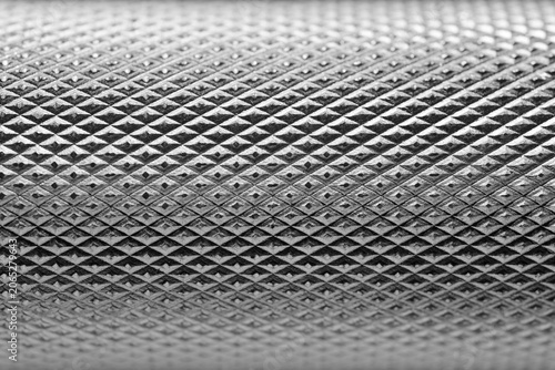 Closeup view of a dumbbell handle in a gym