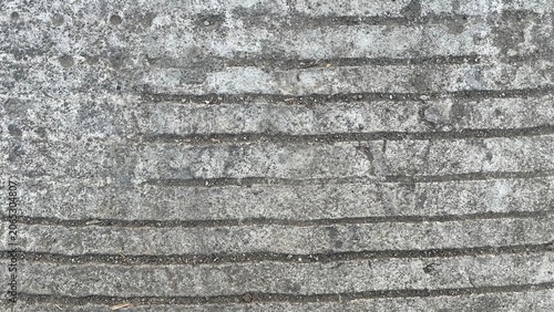 Foto Rough Grooved Concrete Road Texture with Natural Weathering