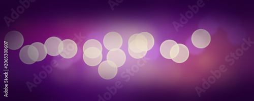 Purple Pink Bokeh Background with Glowing Defocused Light Circles
