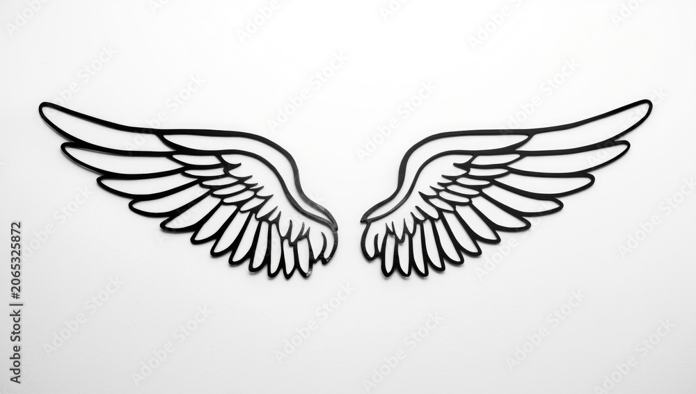 Obraz premium Black outline of angel wings on a white wall