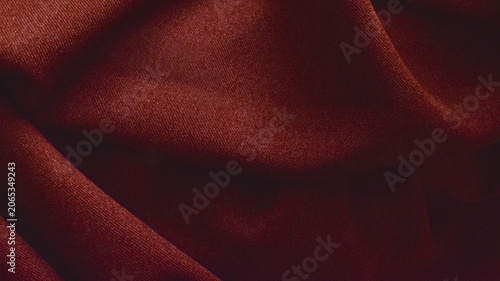 Fotografie Terracotta burgundy fabric texture with soft elegant folds