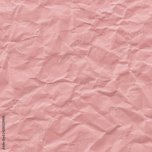 Photos Crumpled pink paper texture with visible creases and folds.