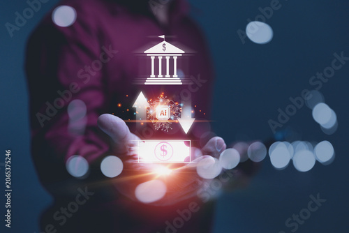 Businessman Holding a Glowing Financial Ecosystem features an artificial intelligence microchip graphic flanked by transactional up and down arrows.
