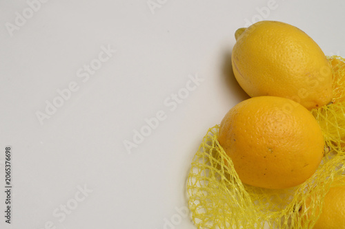 lemons on a white background close up with generous copy space, horizontal composition border layout