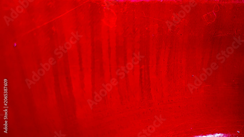 red metal texture background. Matte metal with a shiny red gradient.